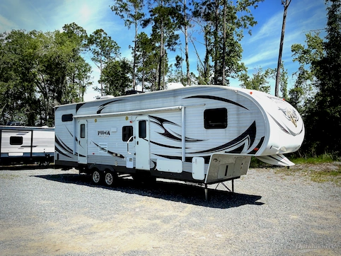 Used 2013 Palomino Puma Unleashed 356-QLB Featured Photo